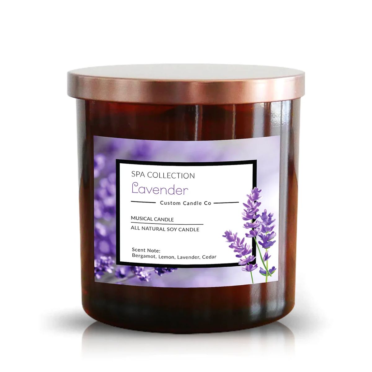 The Musical Spa Lavender Candle comes in a brown glass jar with a metallic lid and a “SPA COLLECTION Lavender, Custom Candle Co” label featuring lavender flowers—perfect for relaxation and spa-like ambiance.