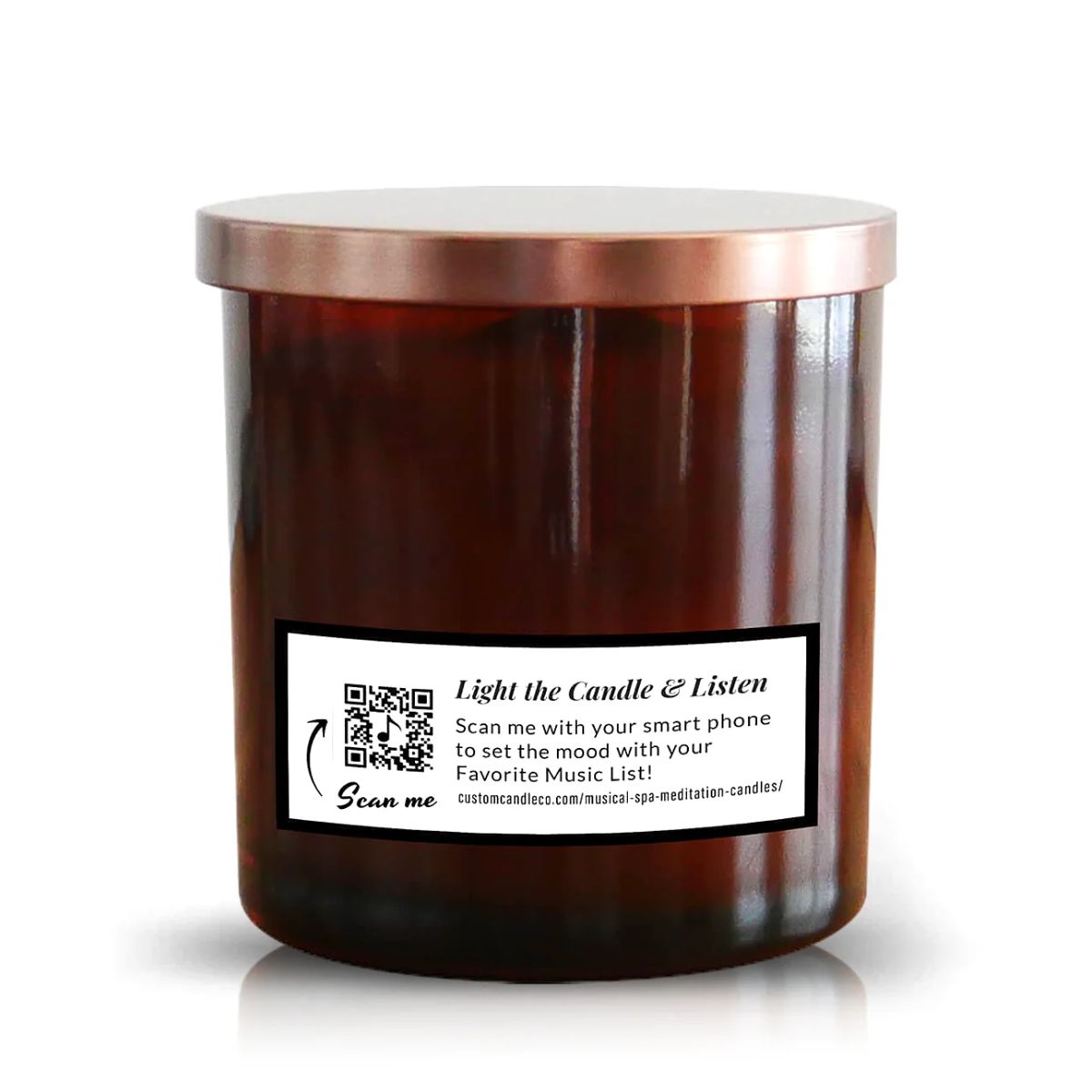 The Musical Spa Lavender Candle is a brown glass soy candle with a metallic lid and a label featuring a QR code and instructions to scan for a relaxing music playlist.