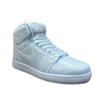 The AJ-1 Baby Blue Sneaker Candle – Large (On Backorder), hand poured and shaped like a high-top sneaker in light blue, is displayed against a plain white background.