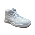 The AJ-11 Baby Blue Hightop Sneaker Candle – Large (On Backorder) is a hand-poured candle crafted to resemble a classic athletic shoe, shown on a white background.