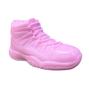The AJ-11 Baby Pink Hightop Sneaker Candle – Large (On Backorder) features a unique athletic shoe design and is infused with a subtle black ice fragrance.