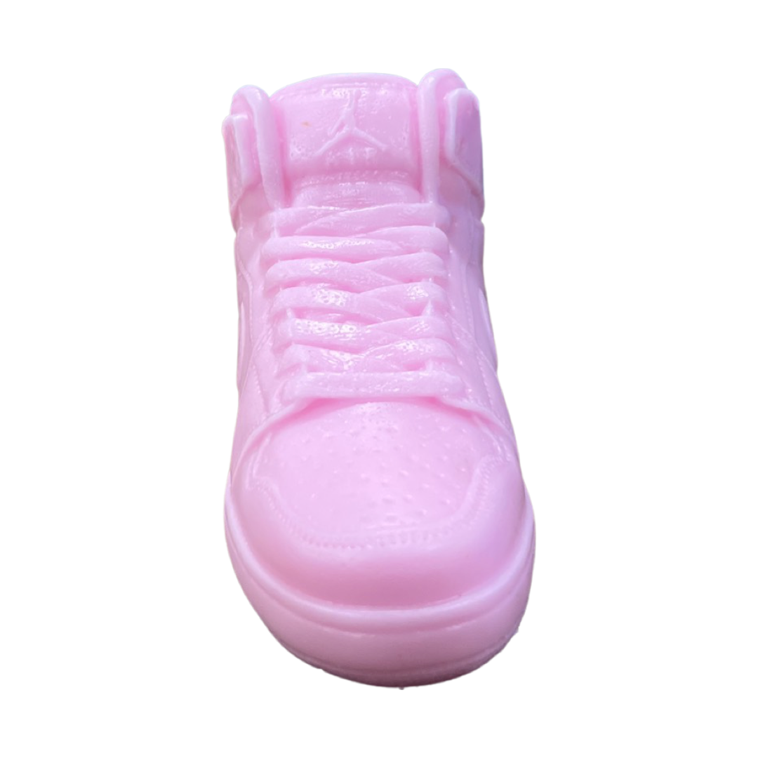 The AJ-1 Baby Pink Sneaker Candle – Large (On Backorder) is a hand-poured candle crafted to look like a baby pink sneaker, displayed from the front on a white background.