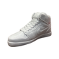 A white high-top Nike sneaker with laces is paired next to the large AJ-1 Gray Sneaker Candle (currently on backorder), both displayed at an angle showing the side and front against a plain white background.
