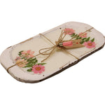The Pink Floral Wood Candle is a rectangular white decorative tray adorned with pink flowers and green leaves, tied with twine and a tag—perfect as a rustic centerpiece or for displaying your favorite floral scented candle.