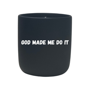 The Quoted - "God Made Me" Do It Candle is a black matte holder with "GOD MADE ME DO IT" in bold white letters—ideal for displaying your natural wax or feng shui candle.