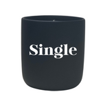 The Quoted - "Single" Candle is a black holder with "Single" in bold white print, designed to perfectly hold your favorite all natural wax or custom candle.