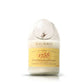 The Recycled Cognac Candle is crafted from upcycled cognac bottles, styled after a Rémy Martin 1738 bottle with a yellow label, clear packaging, and displayed on a plain white background.