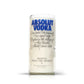 A Recycled Swedish Vodka Candle, crafted from a clear glass Absolut Vodka bottle featuring blue and black text, sits on a white background—ideal as an artisanal or eco-friendly candle.