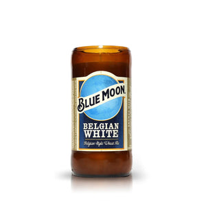 A Recycled Belgian White Beer Candle made from a repurposed bottle with the top cut off, displayed against a plain white background.