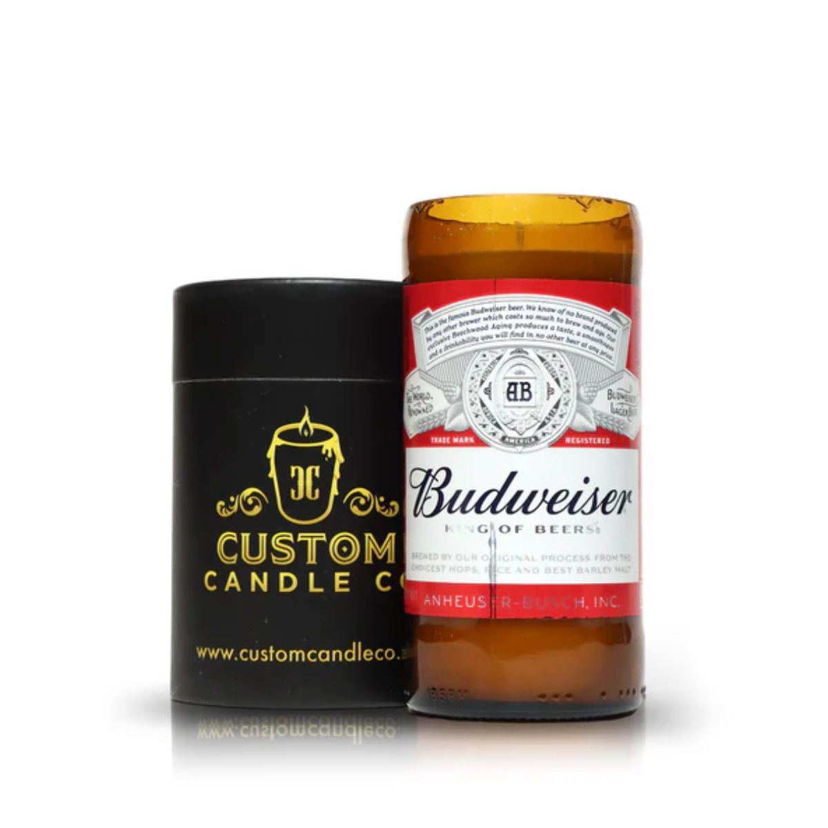 A Custom Candle Co. hand-poured candle in a black cylindrical box is displayed beside a Recycled American-Style Beer Candle crafted from a repurposed Budweiser bottle.