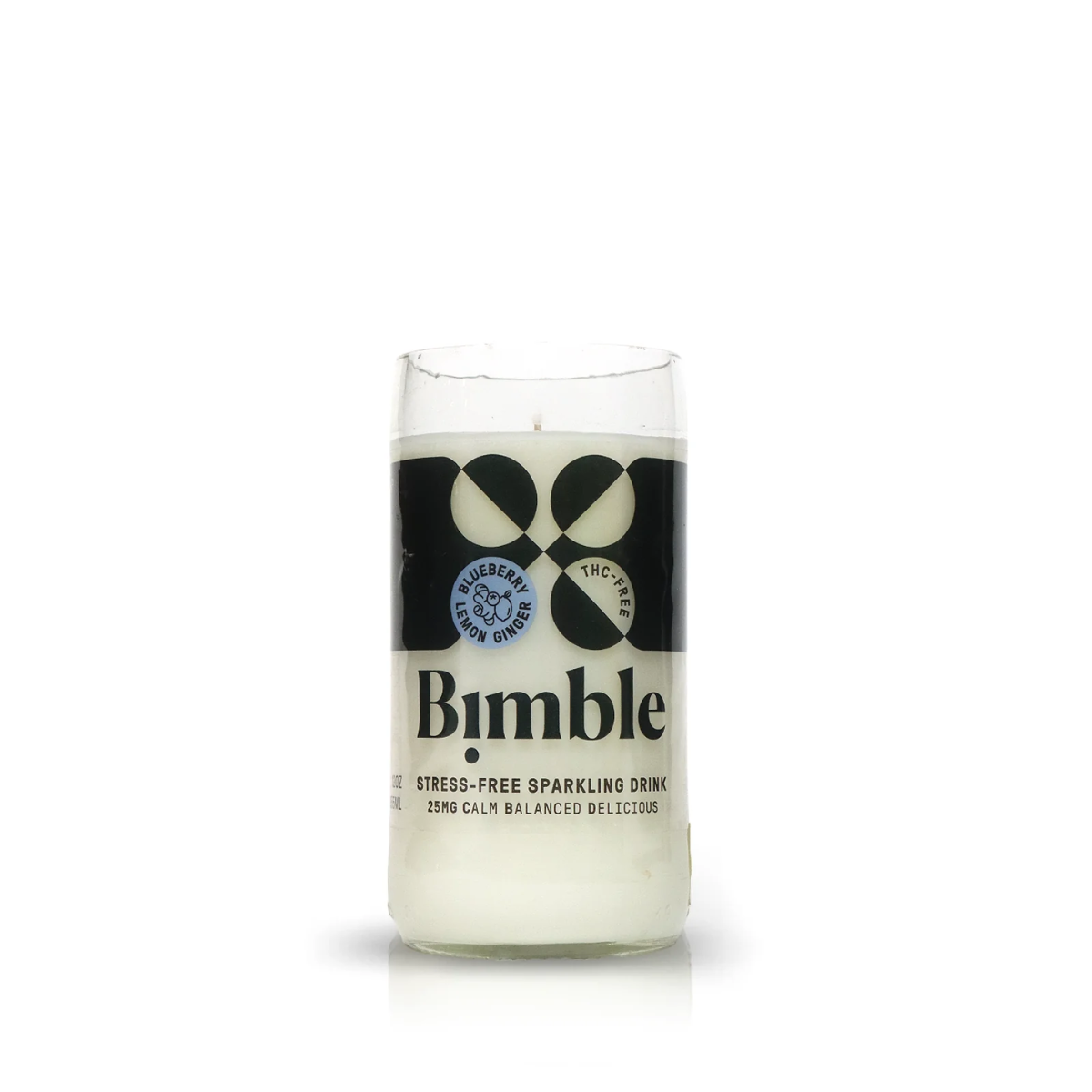 A clear glass labeled "Recycled Sparkling Water Candle" holds a white liquid. The label highlights 25mg THC for calm, balanced, delicious stress-free sipping—and the bottle is ideal for upcycling as a candle after you finish.