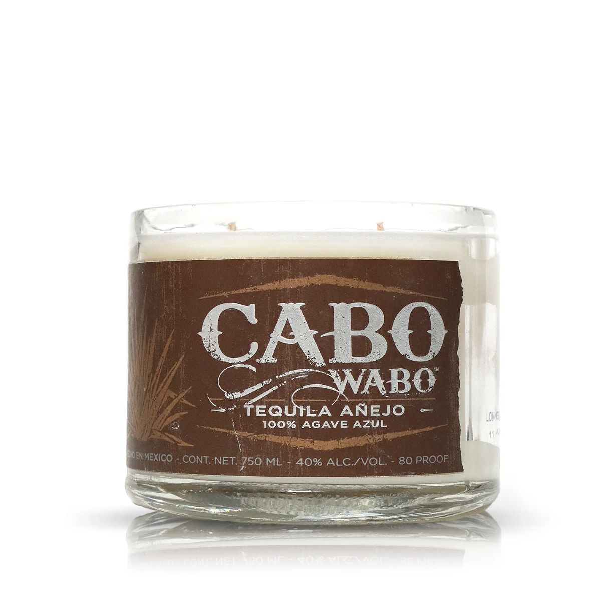 The Recycled Azul Agave Anejo Tequila Candle is made from a reclaimed tequila bottle, features a brown "CABO WABO Tequila Añejo 100% Agave Azul" label, and contains a white candle.