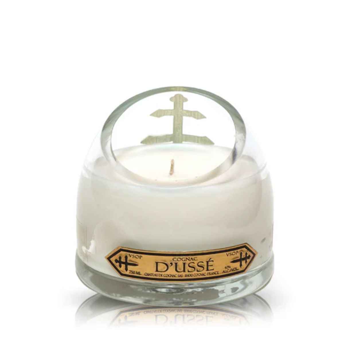 The Recycled Cross of Lorraine Cognac Candle features coconut-apricot wax in a white glass container, adorned with a gold D'Ussé cognac label and cross emblem—bringing cognac bottle candle elegance to your space.