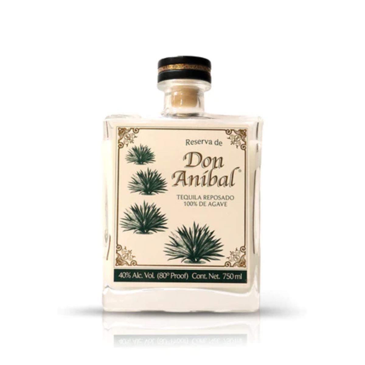 The Recycled Reserva Reposado Tequila Candle comes in a square Don Anibal tequila bottle with a cream label, agave illustrations, and gold accents. This unique candle is made from a 750ml bottle originally at 40% ABV.