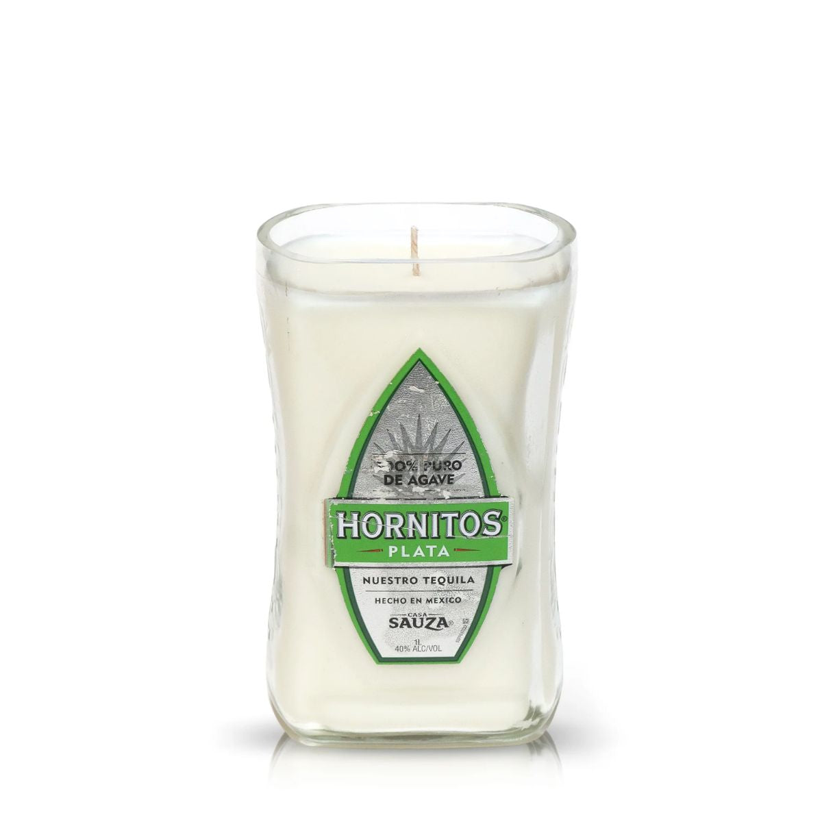 The Recycled Nuestro Tequila Candle is a white soy candle in a clear glass container with a green and silver Hornitos Plata label, perfect for tequila bottle candle fans.