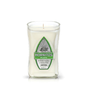 The Recycled Nuestro Tequila Candle is a white soy candle in a clear glass container with a green and silver Hornitos Plata label, perfect for tequila bottle candle fans.