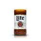 The Recycled Pilsner Beer Candle is hand-poured from an upcycled brown Lite beer bottle with its original label, displayed on a plain white background.