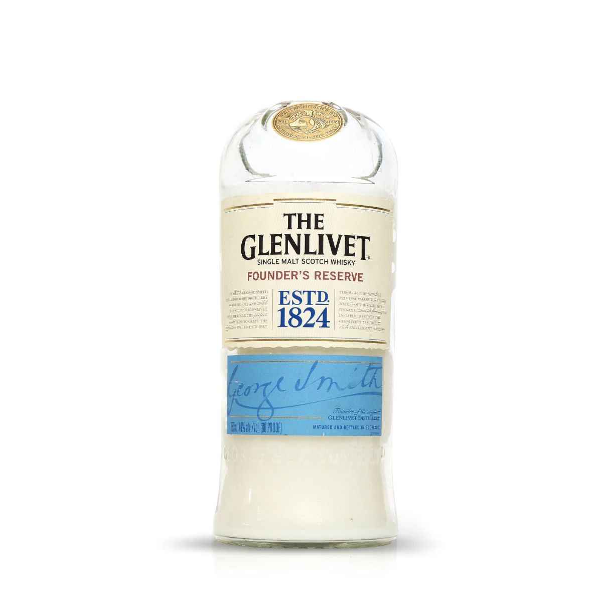 The Recycled Founder’s Reserve Scotch Whiskey Candle is crafted from an upcycled blue-label The Glenlivet bottle, making it a unique and eco-friendly decor piece.