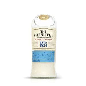 The Recycled Founder’s Reserve Scotch Whiskey Candle is crafted from an upcycled blue-label The Glenlivet bottle, making it a unique and eco-friendly decor piece.