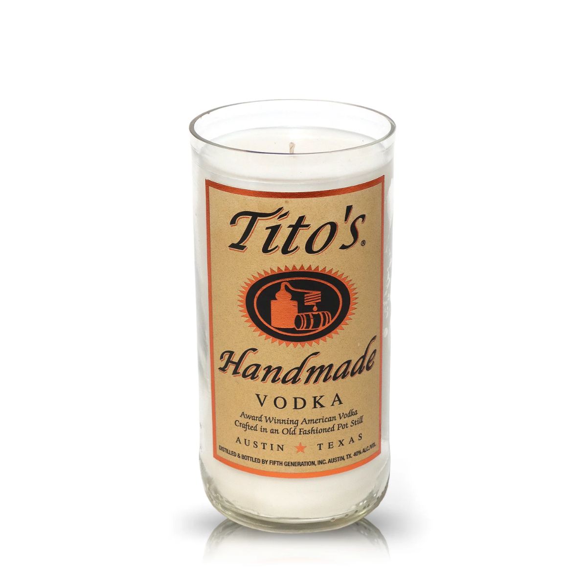 The Recycled Old Fashion Vodka Candle features a Tito's Handmade Vodka label and comes in a glass container crafted from recycled bottles—an eco-friendly, artisanal candle perfect for vodka fans.