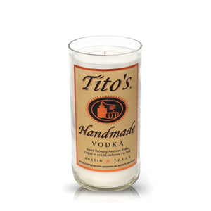 The Recycled Old Fashion Vodka Candle features a Tito's Handmade Vodka label and comes in a glass container crafted from recycled bottles—an eco-friendly, artisanal candle perfect for vodka fans.