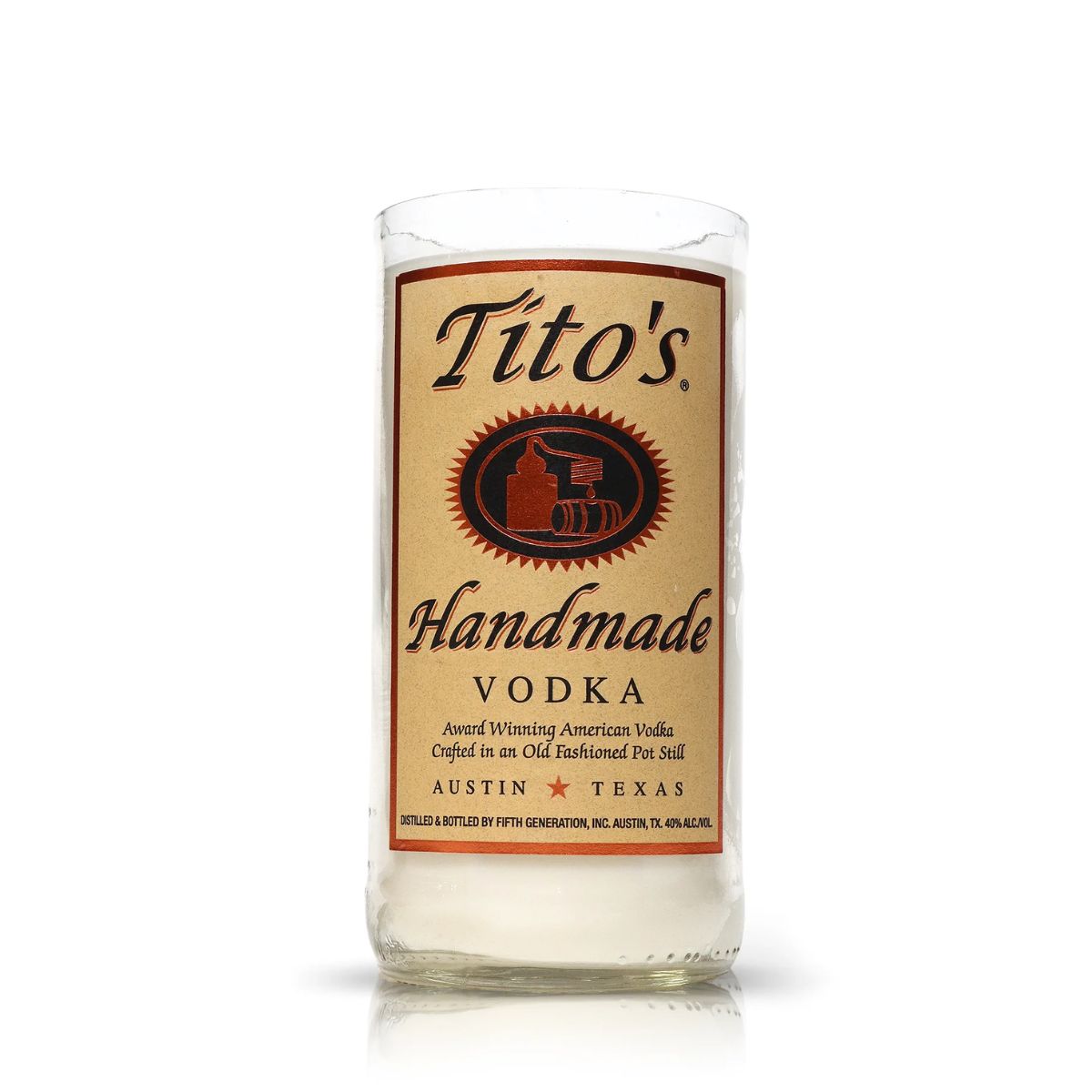 The Recycled Old Fashion Vodka Candle features the Tito's Handmade Vodka logo in brown and orange text, making it perfect for artisanal or upcycled candles crafted from original vodka bottles.