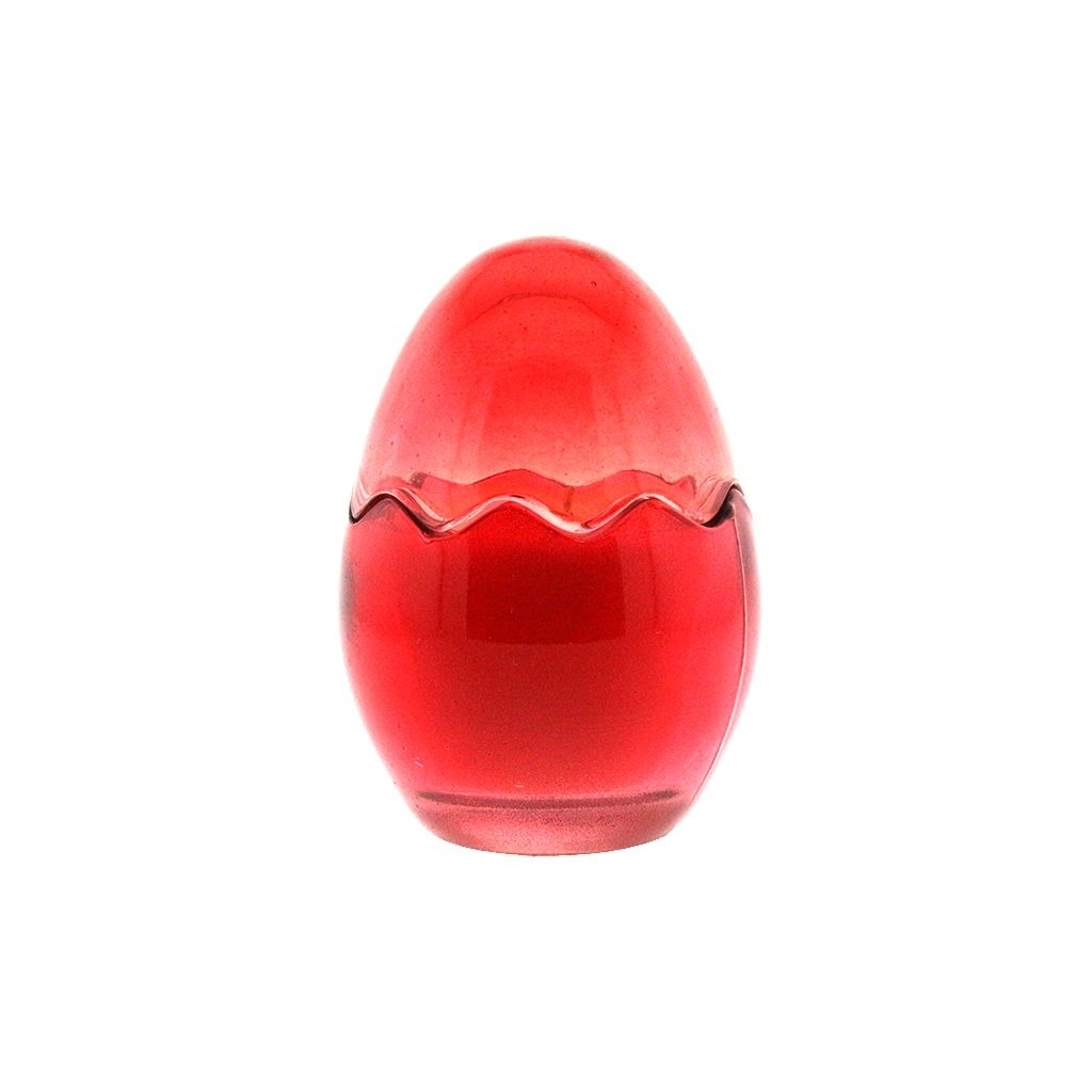 The Red Glass Easter Egg is a red, egg-shaped glass candle with a zigzag pattern around its widest part, made from natural wax and shown from the front against a white background.