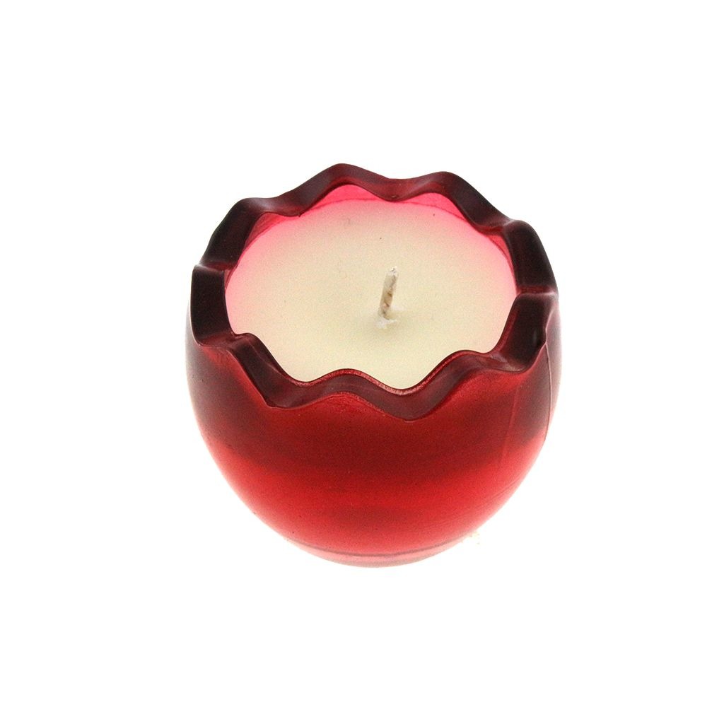 The Red Glass Easter Egg is a round, red glass candle holder with a wavy rim, featuring a centered wick and filled with white natural wax.