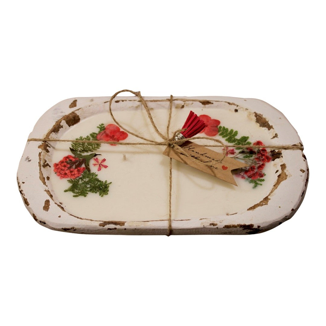 The Red Floral Wood Candle – Floral Scented is a rectangular decorative wax tablet with pressed flowers, placed on a distressed white tray and tied with twine, finished with a small tag.