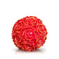 Gold Shimmer - Red Rose Candle: A round red candle with intricate rose patterns and elegant gold accents, beautifully presented against a white background.