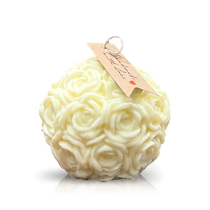 A white, spherical soap with rose carvings and a brown tag on top, similar in elegance to the Yellow Pastel Rose Candle.