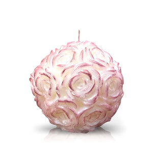 The Pink Shimmer - White Rose Candle is a round, hand-poured candle with a textured surface resembling pink and white roses, shown upright on a white background.