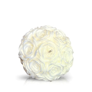 The Silver Shimmer - White Rose Candle is a hand-poured, round candle designed as a cluster of roses, featuring a single wick at the center and displayed against a plain white background.