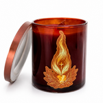 Brown candle with decorative design on a white background