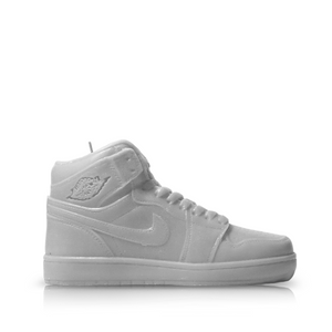Side view of the Jordan 1 Small Sneaker Candle (On Backorder), a light gray, high-top candle expertly crafted to mimic the iconic Air Jordan 1 silhouette, shown against a plain white background.