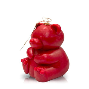 The Teddy Bear Red Chubby Candle, crafted from natural wax with a small gold loop and string on top, sits against a white background—an ideal charming Valentine’s Day gift.