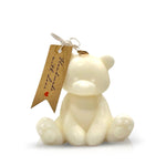 The Teddy Bear White Baby Candle, shaped like a cream-colored bear, comes with a "Handmade with love" brown tag on its ear—perfect as a Valentine’s Day gift or paired with adorable bear-shaped soap.