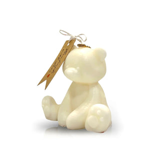 The Teddy Bear White Baby Candle is a cute, natural wax candle that sits upright with a brown tag—an adorable gift for Valentine’s Day.