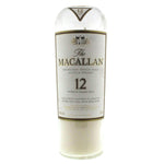The Recycled Highland Scotch Whiskey Candle is crafted from upcycled bottles of Macallan 12 Year Old, featuring the signature white and gold label—perfect for eco-friendly candle lovers.