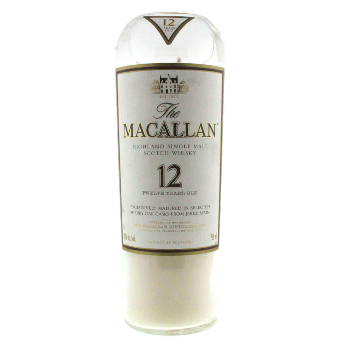 The Recycled Highland Scotch Whiskey Candle is crafted from upcycled bottles of Macallan 12 Year Old, featuring the signature white and gold label—perfect for eco-friendly candle lovers.