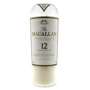 The Recycled Highland Scotch Whiskey Candle is crafted from upcycled bottles of Macallan 12 Year Old, featuring the signature white and gold label—perfect for eco-friendly candle lovers.