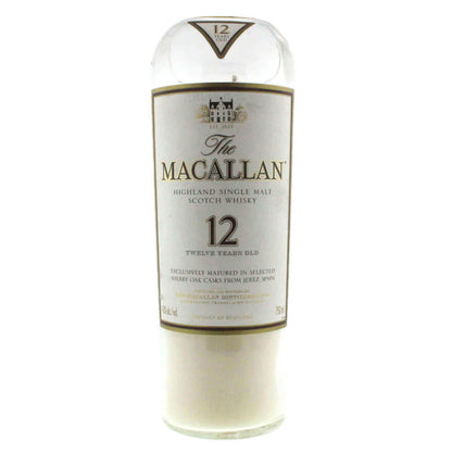 The Recycled Highland Scotch Whiskey Candle is crafted from upcycled bottles of Macallan 12 Year Old, featuring the signature white and gold label—perfect for eco-friendly candle lovers.
