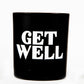 A black Tumbler Candle with "GET WELL" in bold white letters, included in the "Get Well" Candle Gift Box Set—a thoughtful gift for any occasion.