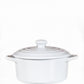 The White Mini Cereal Crockpot Candle is a white ceramic dish with handles and a lid, designed to resemble a stylish crockpot candle, shown against a plain white background.