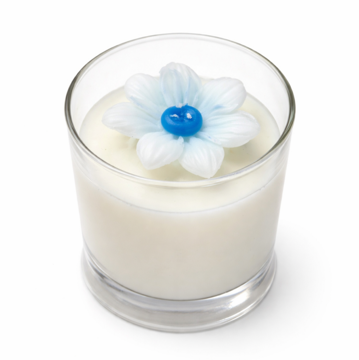 Glass candle with a decorative flower on top against a white background