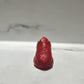 The Y500 – Red Sneaker Candle – Small (On Backorder), hand poured from natural wax, is displayed on a white surface with a blurred gray background.