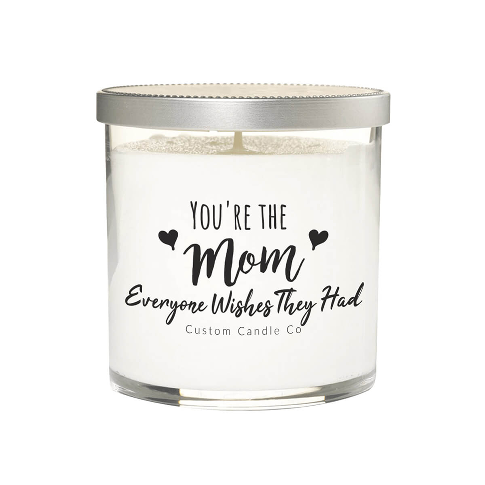 The "You're the mom everyone wishes they had" White Glass Candle in a jar with silver lid makes a perfect heartfelt gift for moms.