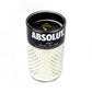 A white textured natural soy candle in a glass container featuring the Black Label Vodka branding, crafted as a Recycled Black Label Vodka Candle with a visible wick at the top.