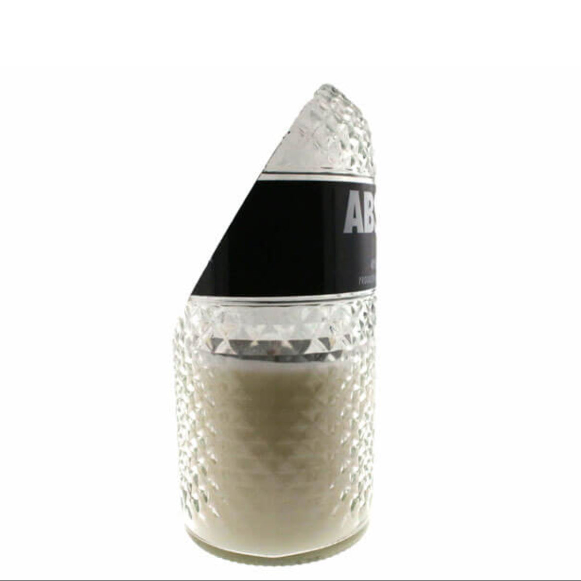 A clear textured glass, partially encased in a recycled Black Label Vodka bottle, is filled with white wax—making this Recycled Black Label Vodka Candle a stylish, eco-friendly accent for your space.
