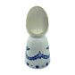 The Recycled Azul Tequila Curve Cut Candle is a white ceramic holder with blue floral patterns, an upright oval-shaped back, and includes a hand-poured soy candle.